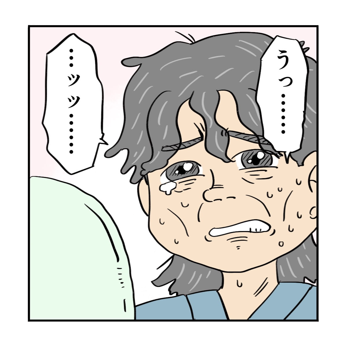 鏡を見ながら涙する患者